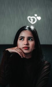 photo of woman looking upwards